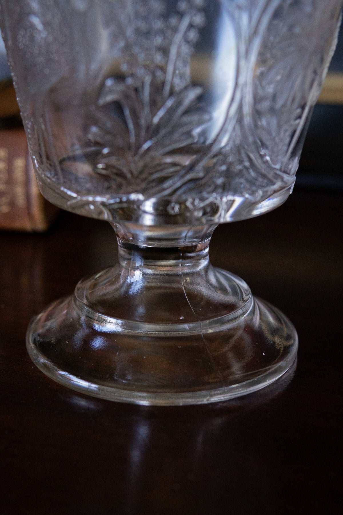 Antique glass pedestal vase with cranes