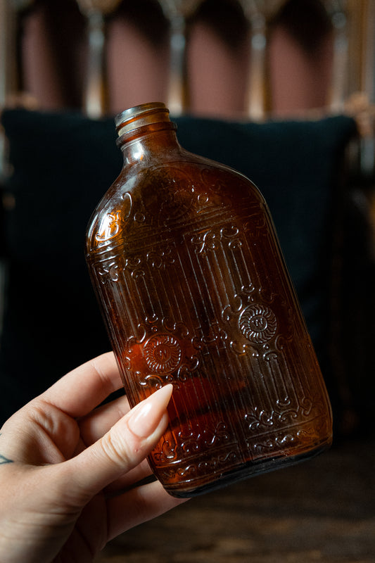 Antique art nouveau style bottle