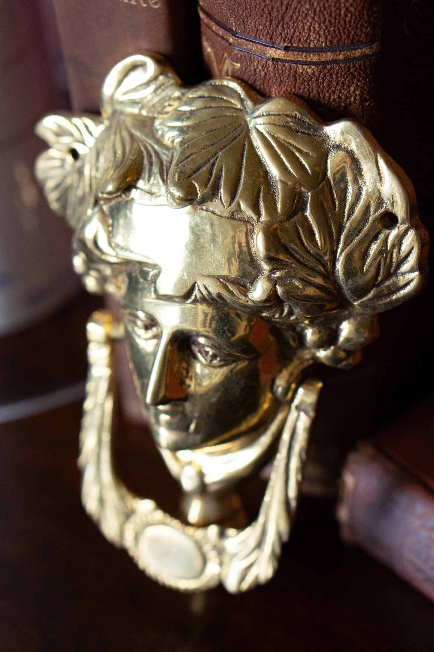 Neoclassical vintage brass door knocker