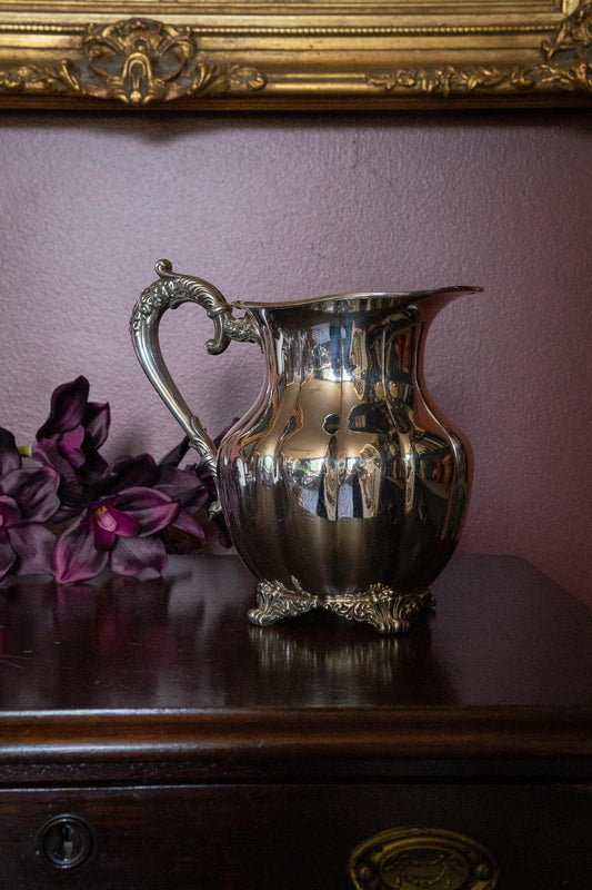 Vintage silver ornate plate water pitcher