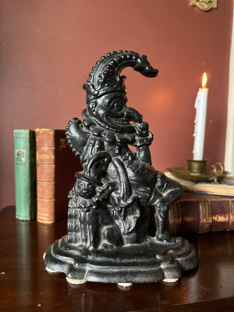 Victorian Mr.Punch and Toby cast iron door stopper
