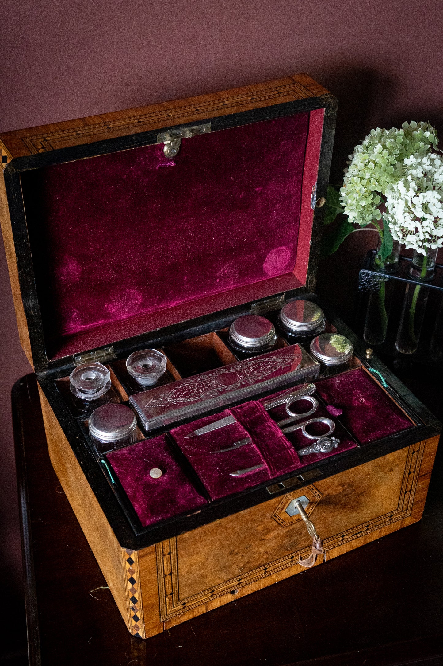 Victorian burl walnut vanity box with original containers