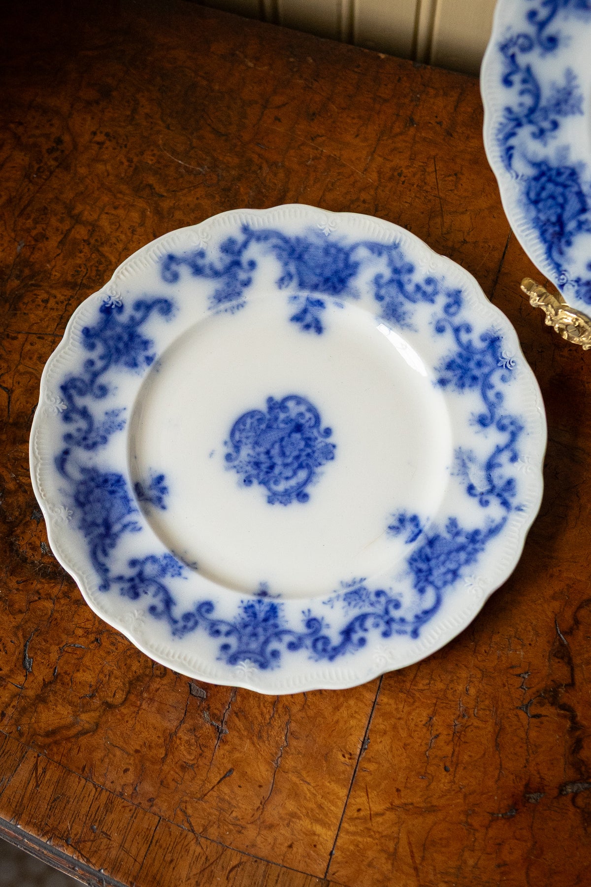 Pair of antique flow blue dessert plates