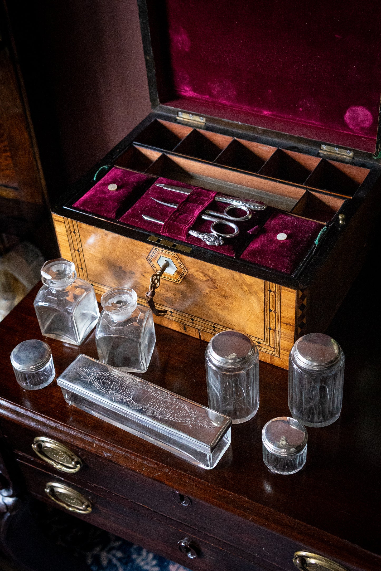 Victorian burl walnut vanity box with original containers