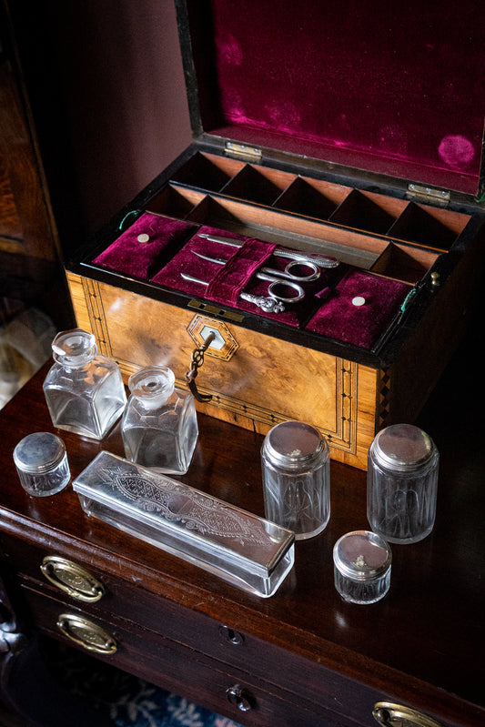 Victorian burl walnut vanity box with original containers