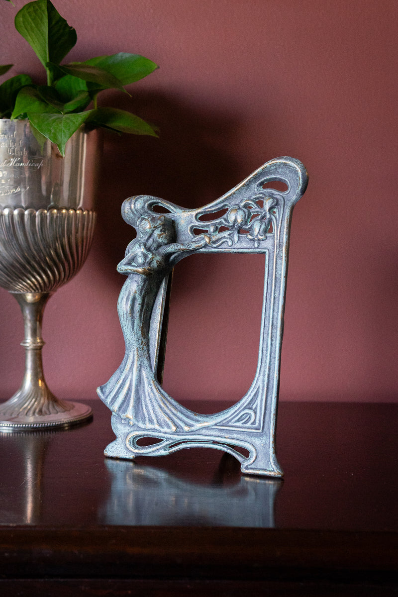 Antique art nouveau picture frame. Bronze lady & floral motif