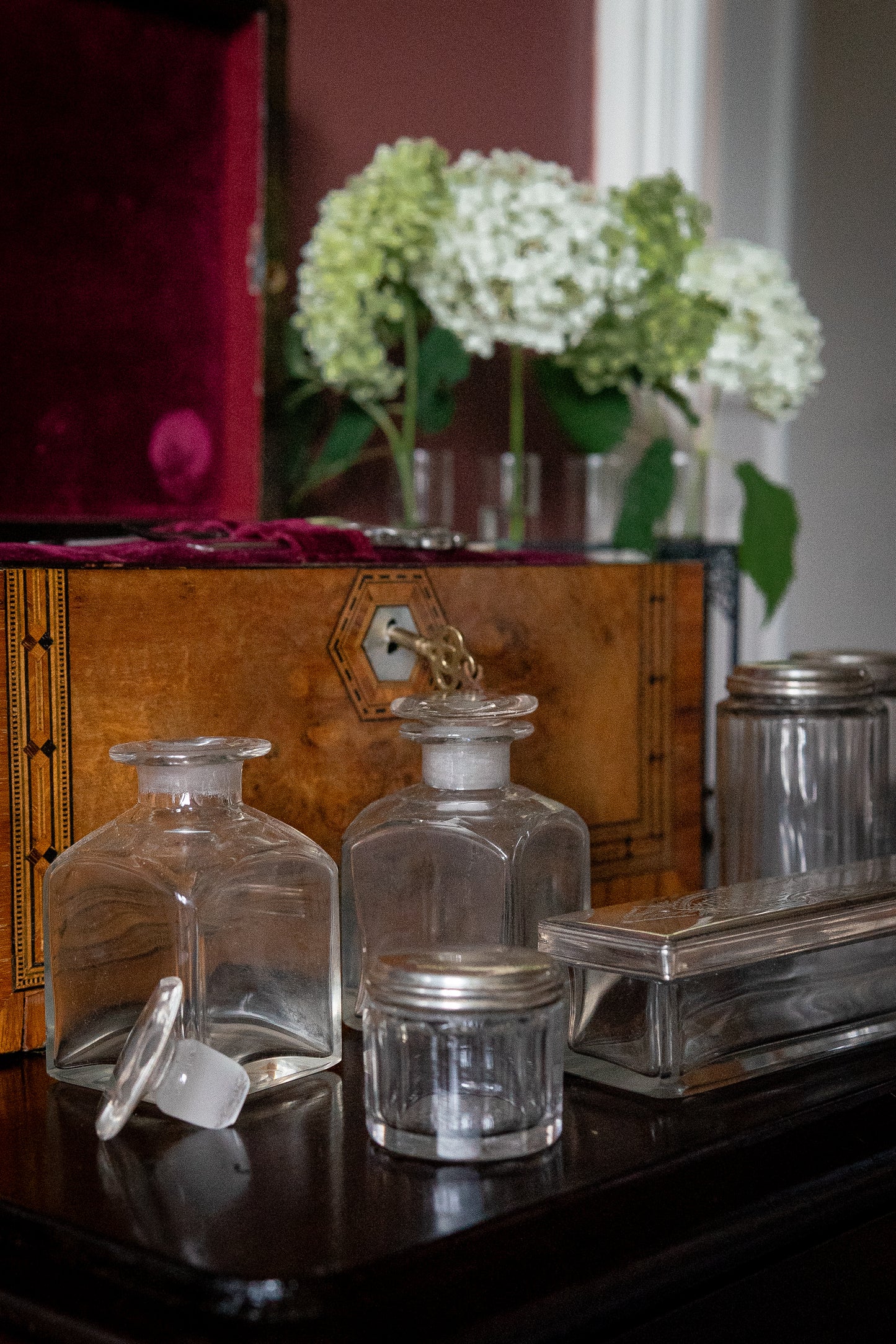 Victorian burl walnut vanity box with original containers
