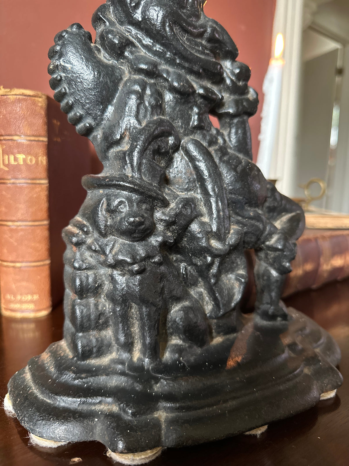 Victorian Mr.Punch and Toby cast iron door stopper