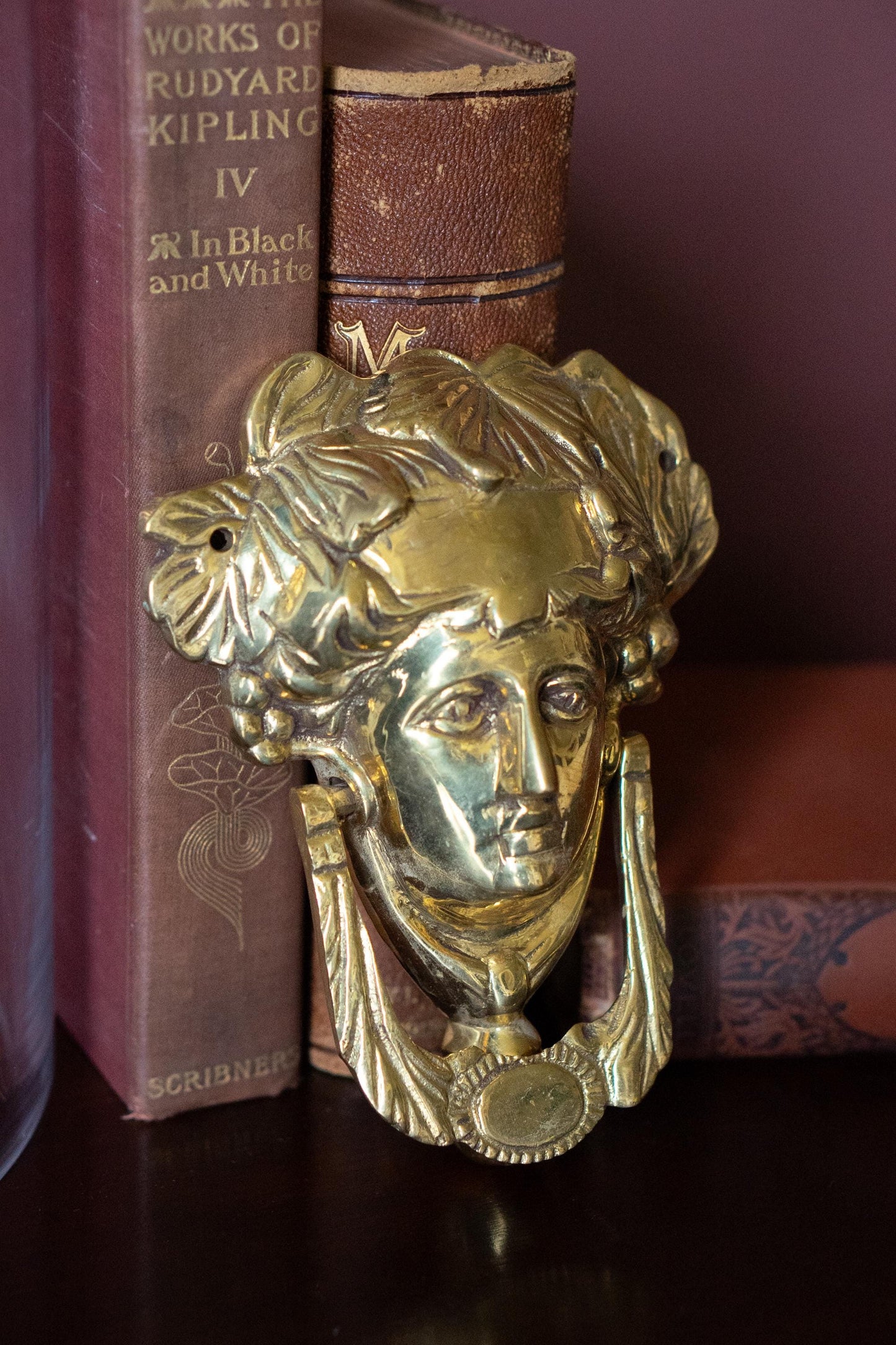 Neoclassical vintage brass door knocker