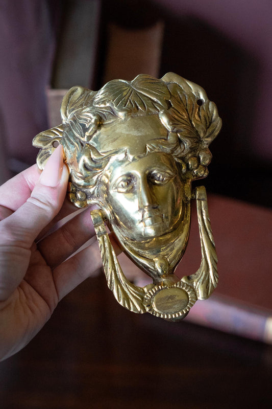 Neoclassical vintage brass door knocker
