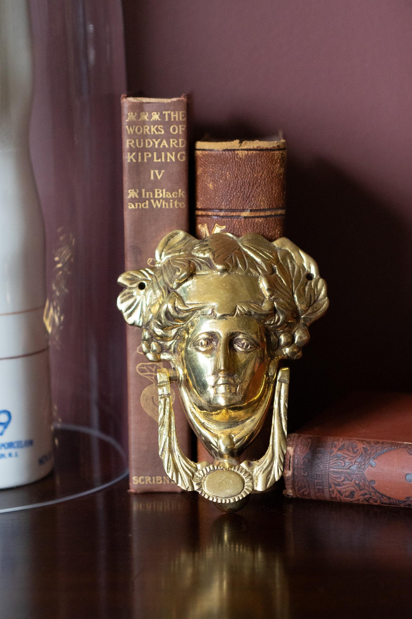 Neoclassical vintage brass door knocker