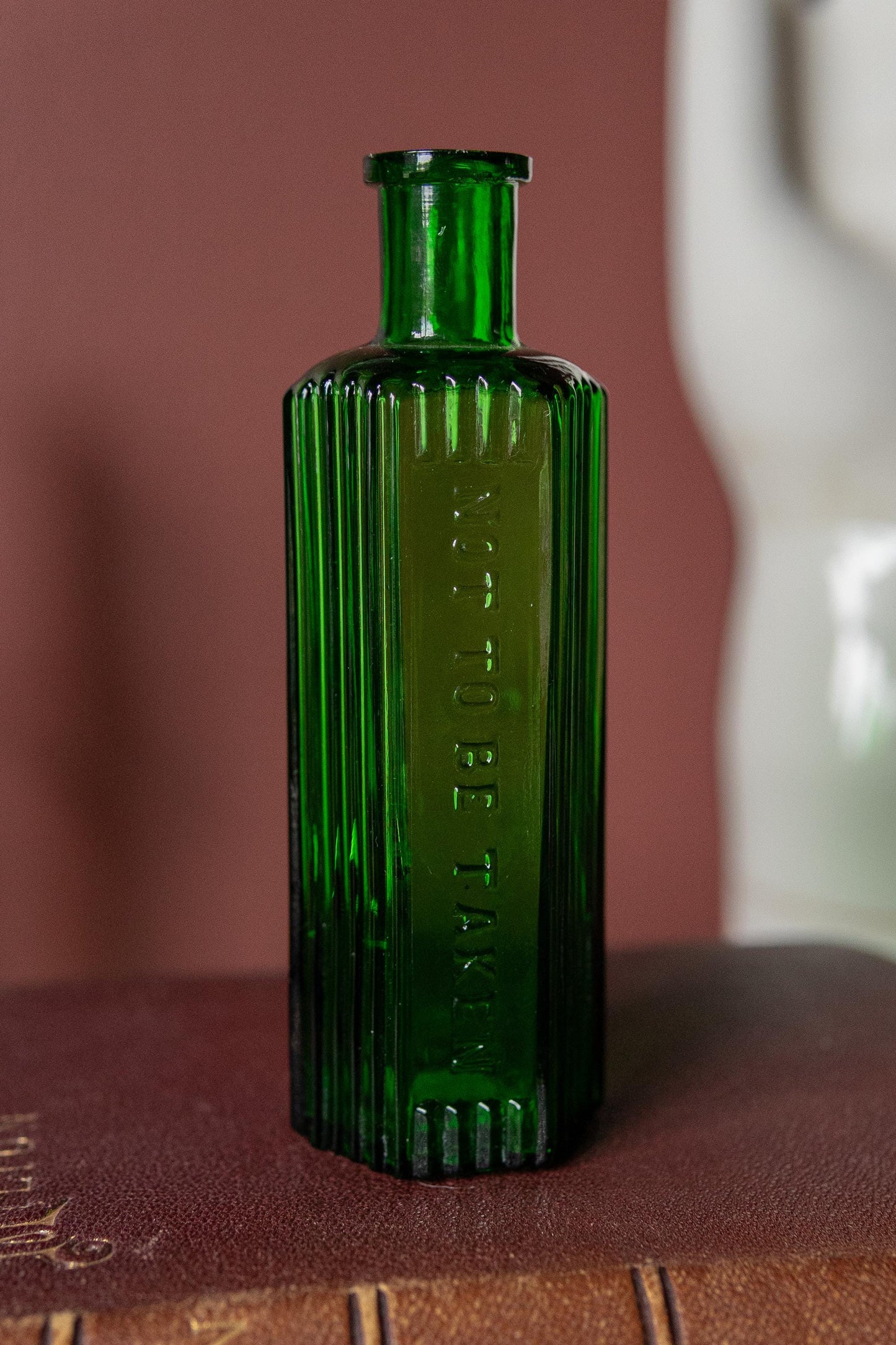 Antique Green Poison Bottle. Embossed “Not To Be Taken”