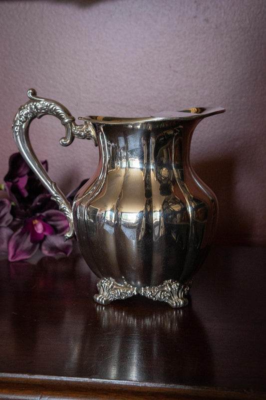 Vintage silver ornate plate water pitcher